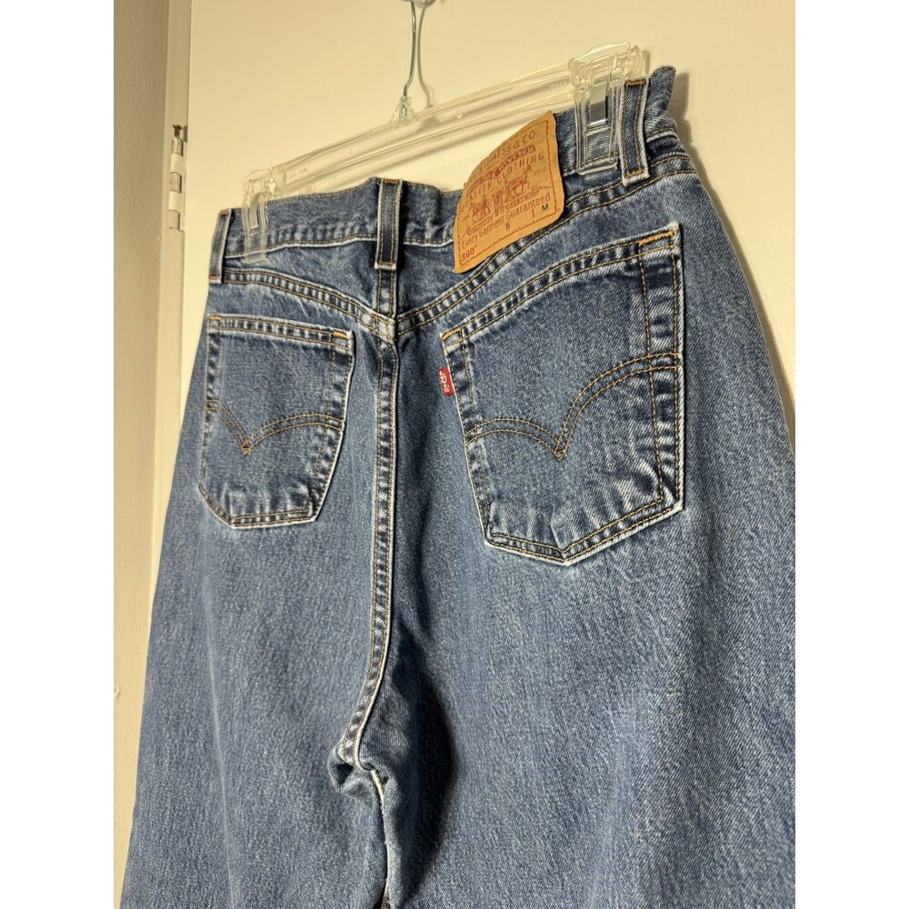 Vintage Levi's 560 Loose Fit Tapered Jeans Size 10 Miss W31 L31 Light Wash